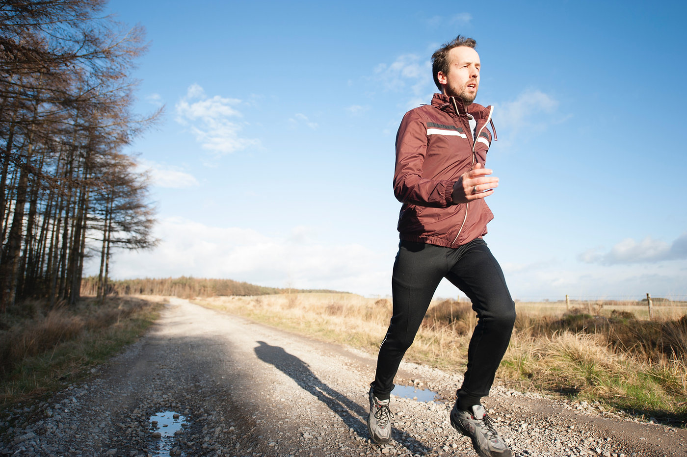 man running in wilderness